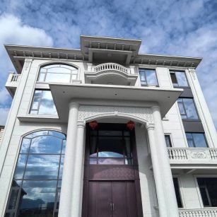 重庆白麻别墅外墙干挂石材效果示例