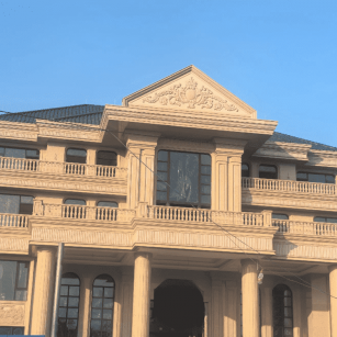 重庆黄金麻别墅外墙干挂石材效果示例