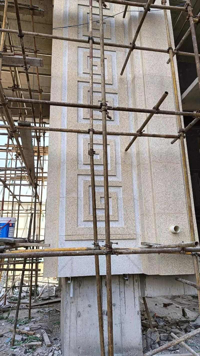 重庆 黄金麻花岗岩别墅外墙干挂回纹造型效果